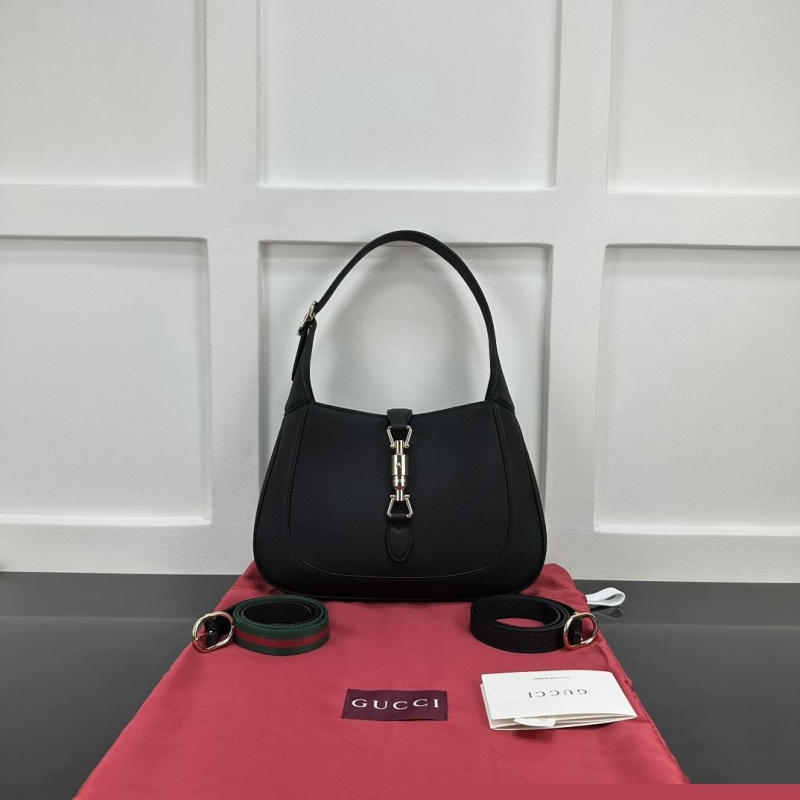 G*u*i top handle bags